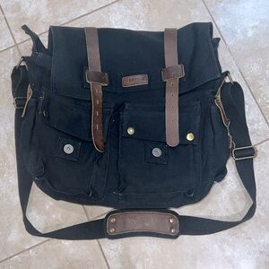 Canvas and Leather Messenger Bag.                  Color: Black
